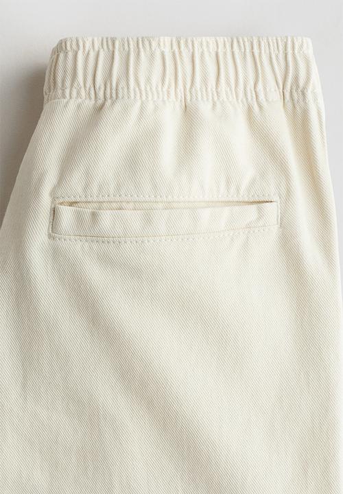 H&M - Cotton twill joggers - cream