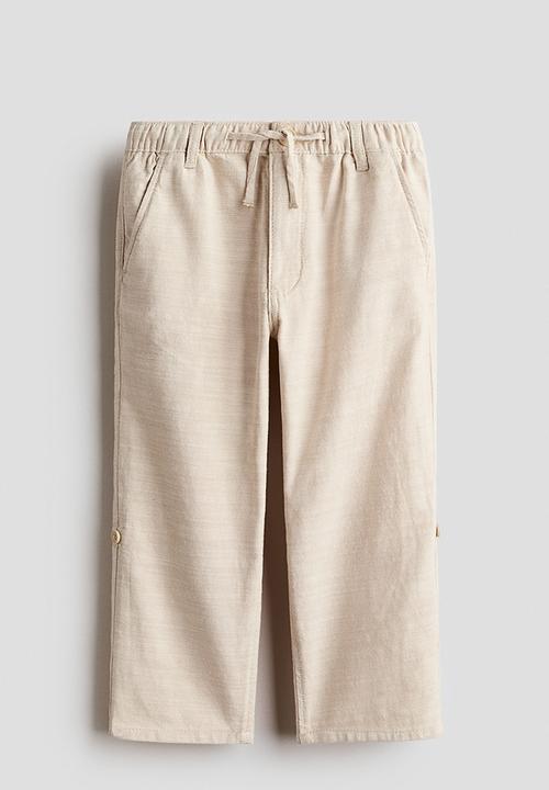 H&M - Cotton roll-up trousers - light beige