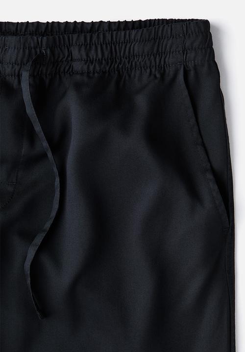 H&M - Relaxed fit lyocell trousers - black