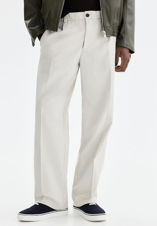 H&M - Relaxed fit cotton and lyocell tailored trousers - light beige