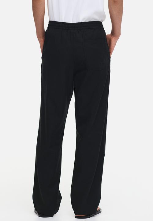 H&M - Relaxed fit trousers - black