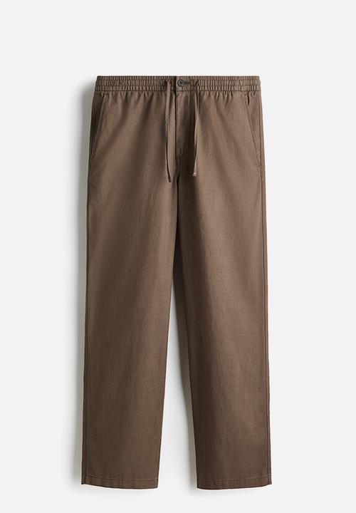 H&M - Relaxed fit trousers - taupe