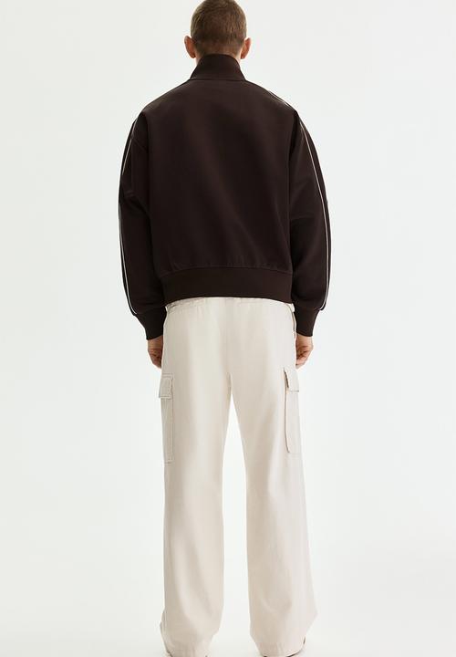 H&M - Relaxed fit cotton cargo trousers - cream