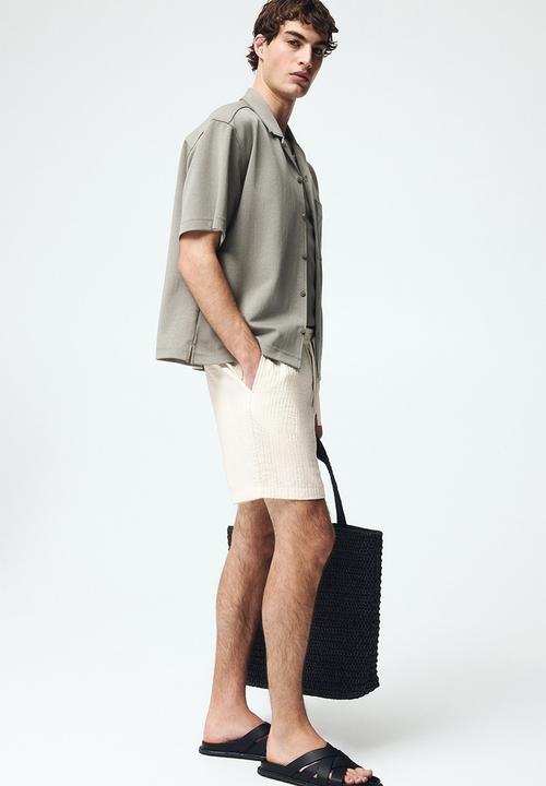 H&M - Relaxed fit textured shorts - white