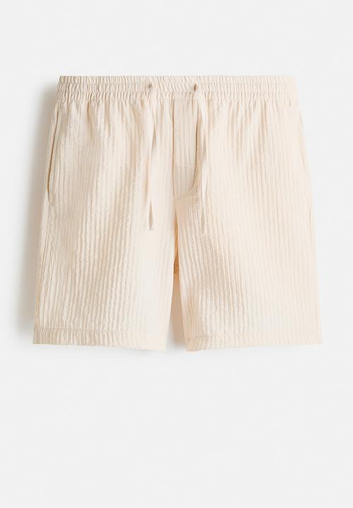 H&M - Relaxed fit textured shorts - white