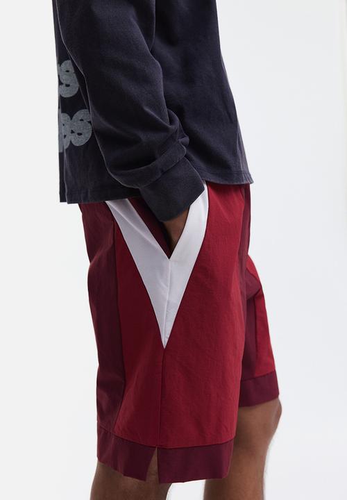 H&M - Loose fit track shorts - burgundy/colour block