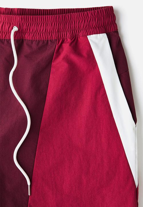 H&M - Loose fit track shorts - burgundy/colour block