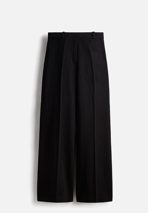 H&M - Wide tailored trousers - black