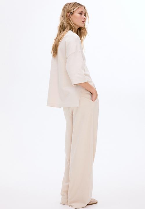 H&M - Wide interlock joggers - light beige