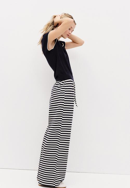 H&M - Knitted trousers - white/navy blue striped