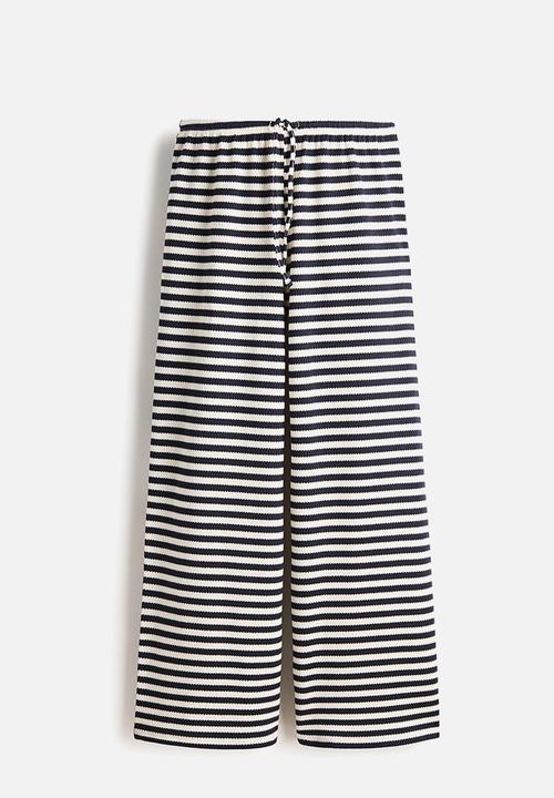 H&M - Knitted trousers - white/navy blue striped