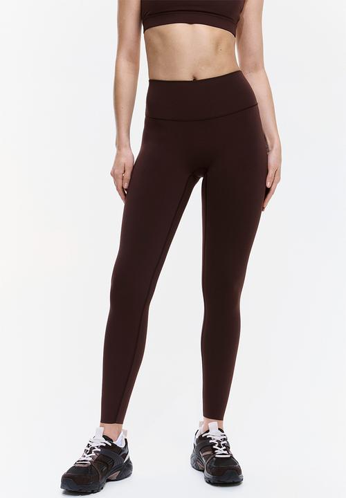 H&M - Sculptmove™ high-waisted leggings - warm brown