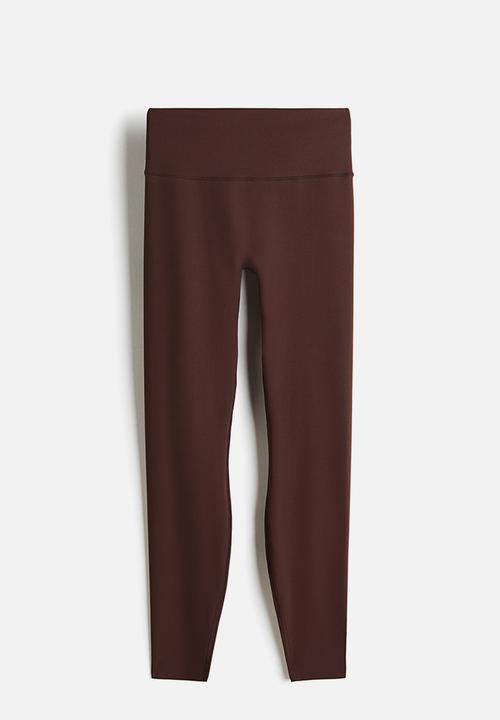 H&M - Sculptmove™ high-waisted leggings - warm brown
