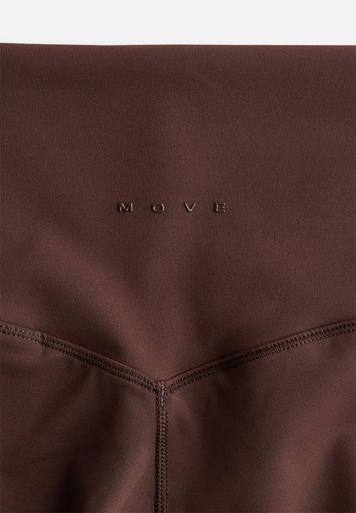H&M - Sculptmove™ high-waisted leggings - warm brown