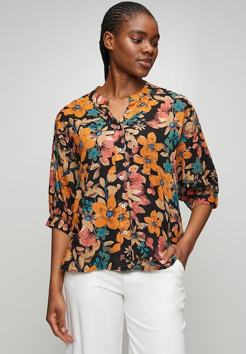 Izabel London - Half Sleeve Batwing Easy Wearing Printed Sheer Blouse With Back Button Stand Detail - Black Multi