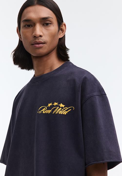 H&M - Oversized fit boxy-style t-shirt - dark blue/run wild