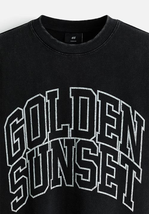 H&M - Oversized fit boxy-style t-shirt - black/golden sunset