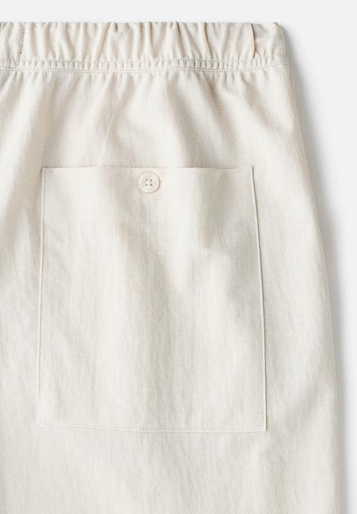H&M - Regular fit cotton-blend trousers - light beige