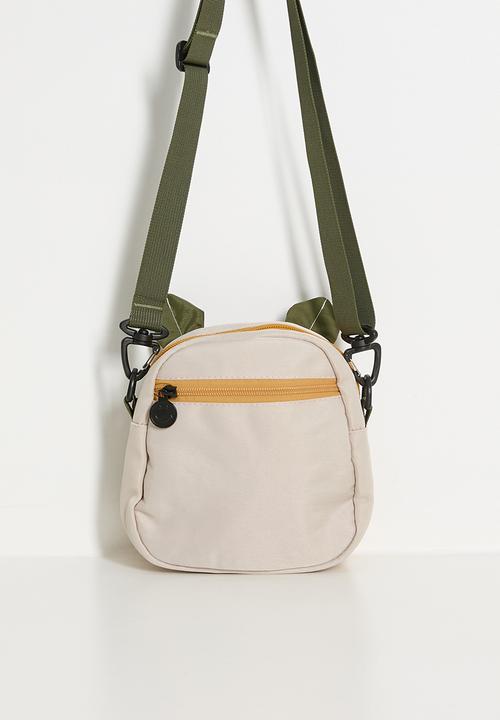 Pop Candy - Cow character sling bag - light beige/multi