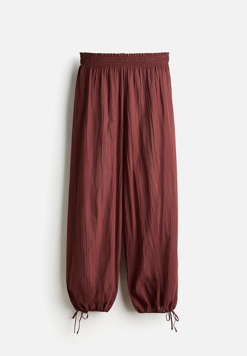 H&M - Crinkled beach trousers - rust brown