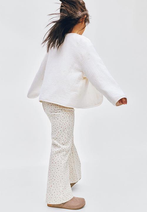 H&M - Flared jeans - cream/floral