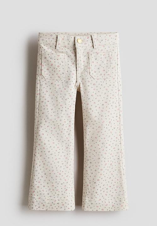 H&M - Flared jeans - cream/floral