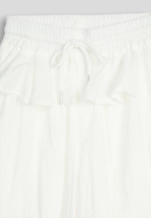Pop Candy - Peplum frill pants - white