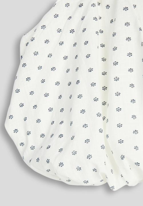 Pop Candy - Polka dot print bubble hem top - white