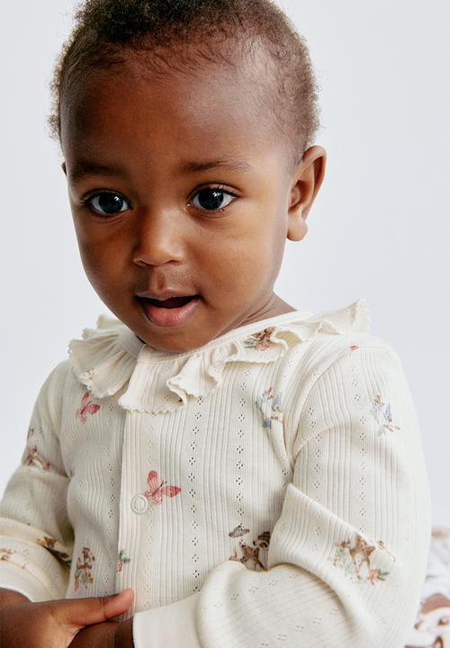 H&M - Printed pointelle sleepsuit - cream/bambi