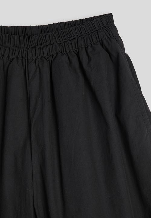 Pop Candy - Ruffle hem wide leg pants - black