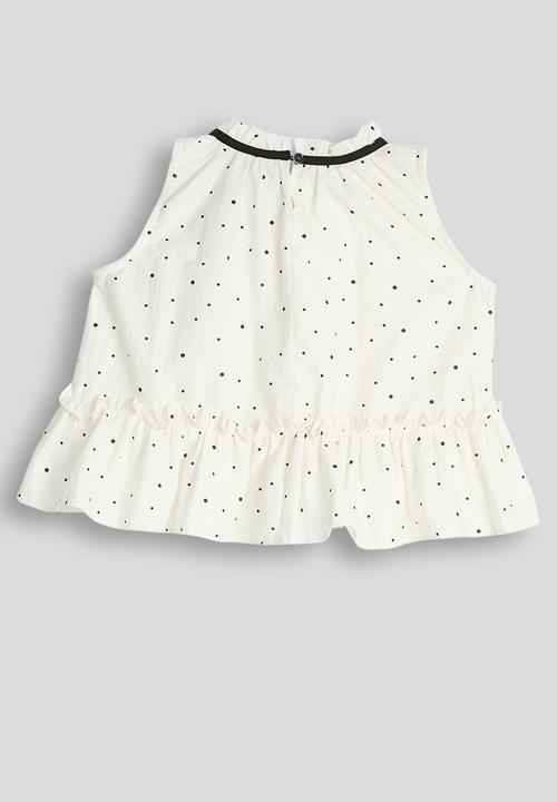 Pop Candy - Dotted pattern dropped hem top - cream
