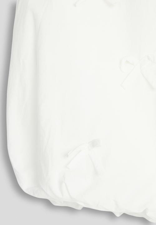 Pop Candy - Bow applique bubble hem blouse - white