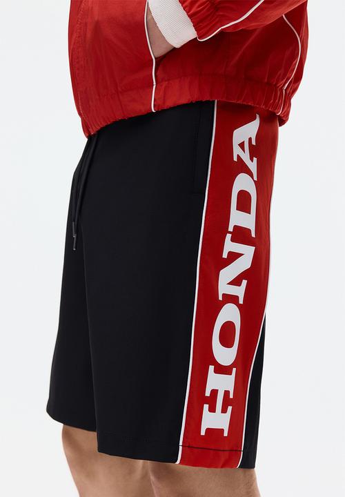 H&M - Loose fit printed shorts - black/honda