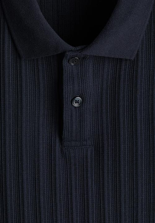 H&M - Slim fit textured jersey polo shirt - navy blue