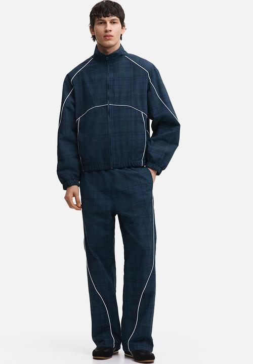 H&M - Nylon track jacket - dark blue/checked