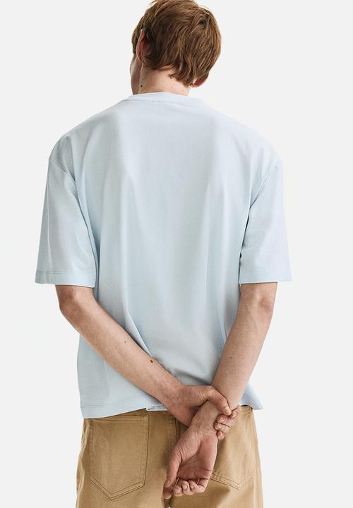 H&M - Loose fit boxy-style T-shirt - light blue