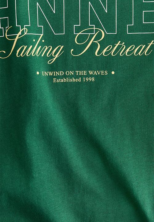 H&M - Printed t-shirt - green/cannes sailing retreat