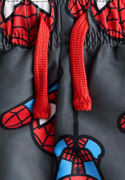 H&M - Printed swim shorts - dark grey/marvel comics