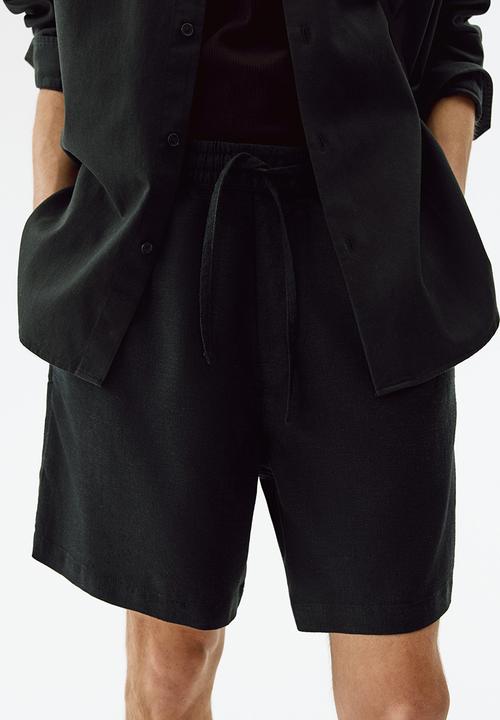 H&M - Relaxed fit linen-blend shorts - black