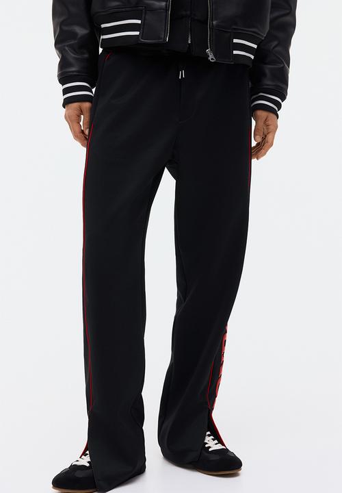 H&M - Relaxed fit joggers - black/honda
