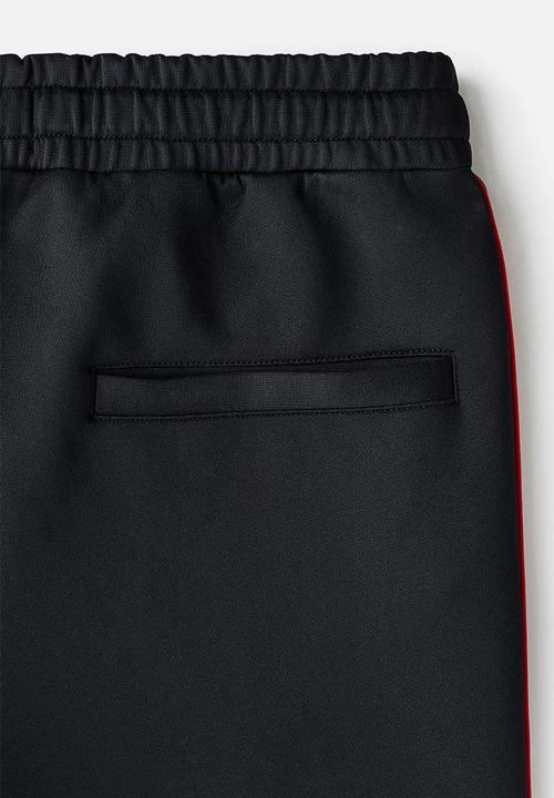 H&M - Relaxed fit joggers - black/honda