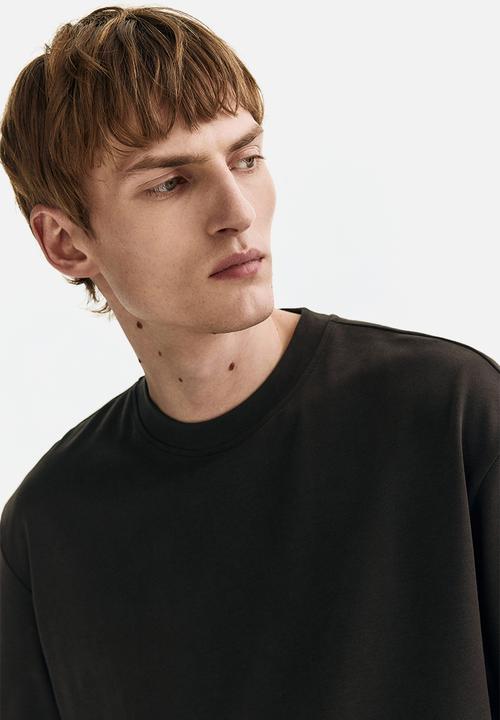 H&M - Loose fit boxy-style T-shirt - black
