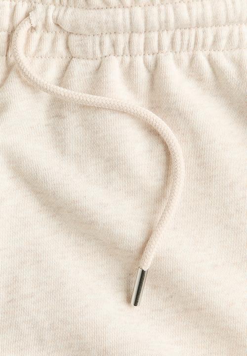 H&M - Sweatshirt shorts - light beige marl