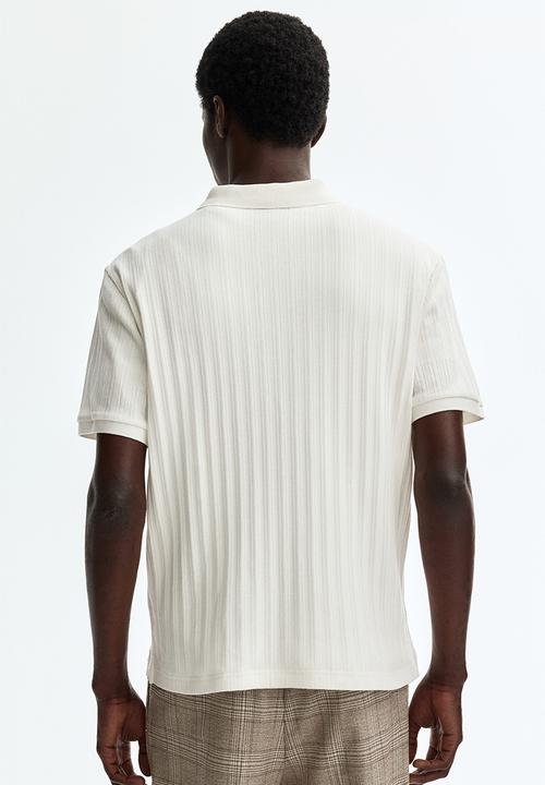 H&M - Slim fit textured jersey polo shirt - cream