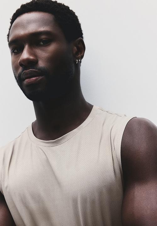 H&M - Regular fit sports vest top with drymove™ - beige