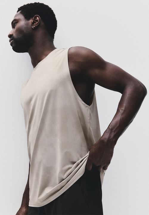 H&M - Regular fit sports vest top with drymove™ - beige