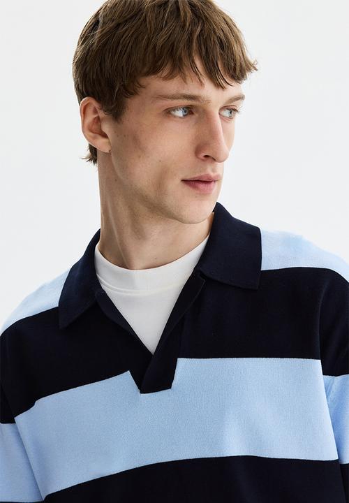H&M - Loose fit polo shirt - navy blue/striped