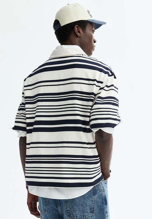 H&M - Loose fit cotton polo shirt - white/striped