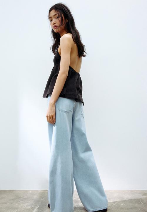H&M - Wide regular waist jeans - light denim blue