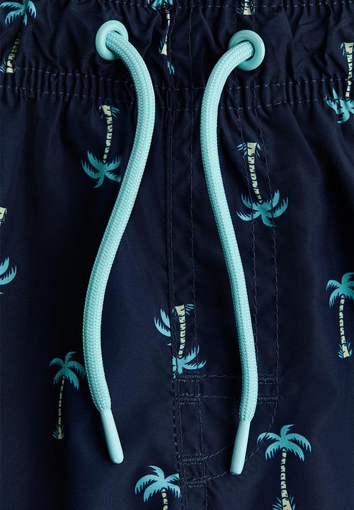 H&M - Printed swim shorts - navy blue/palm trees